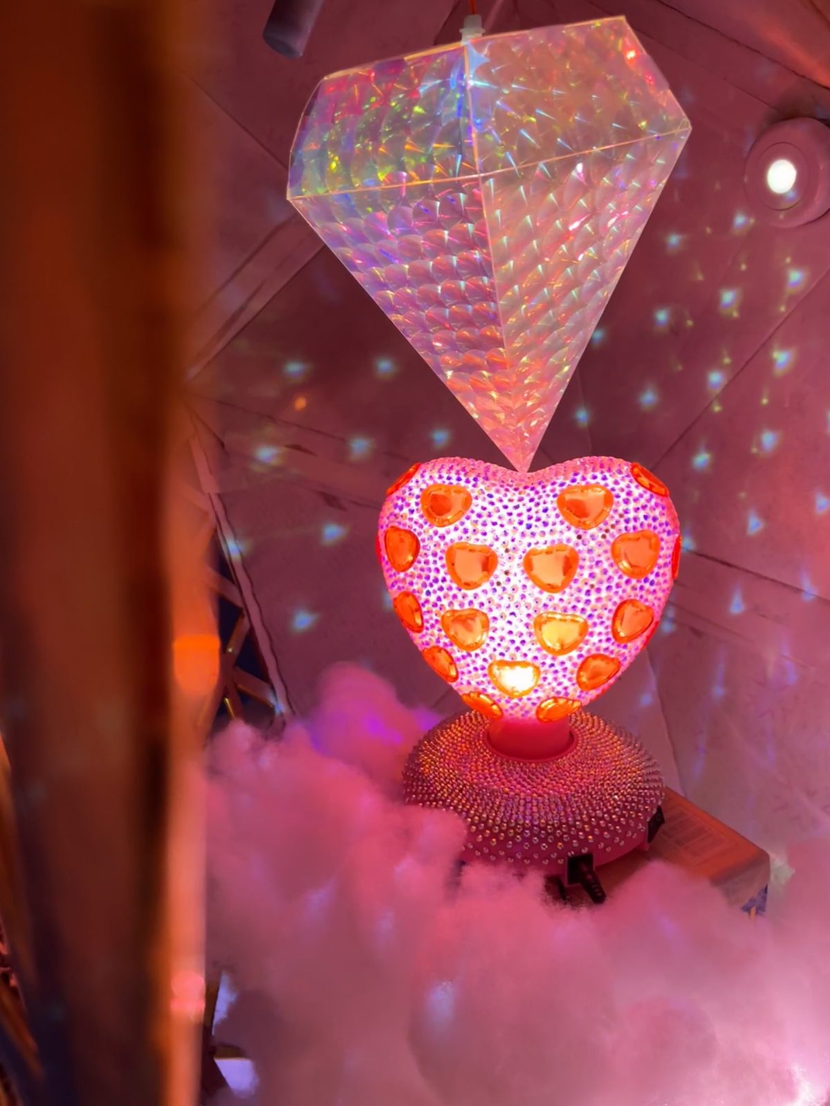 The Spirit Heart, a rhinestoned glowing heart beneath a holographic diamond